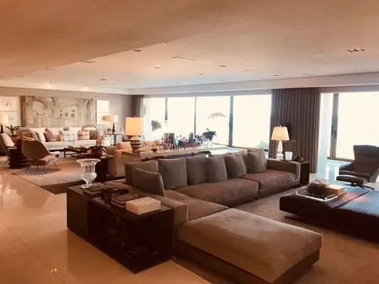 Furnished apartment with an open-plan kitchen and stove