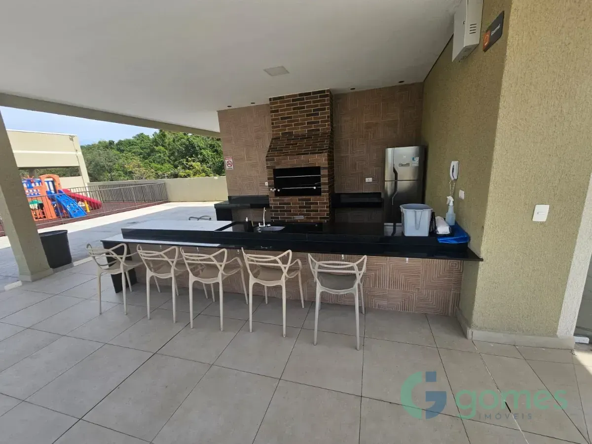 2-bedroom apartment in a building with a pool — photo 16