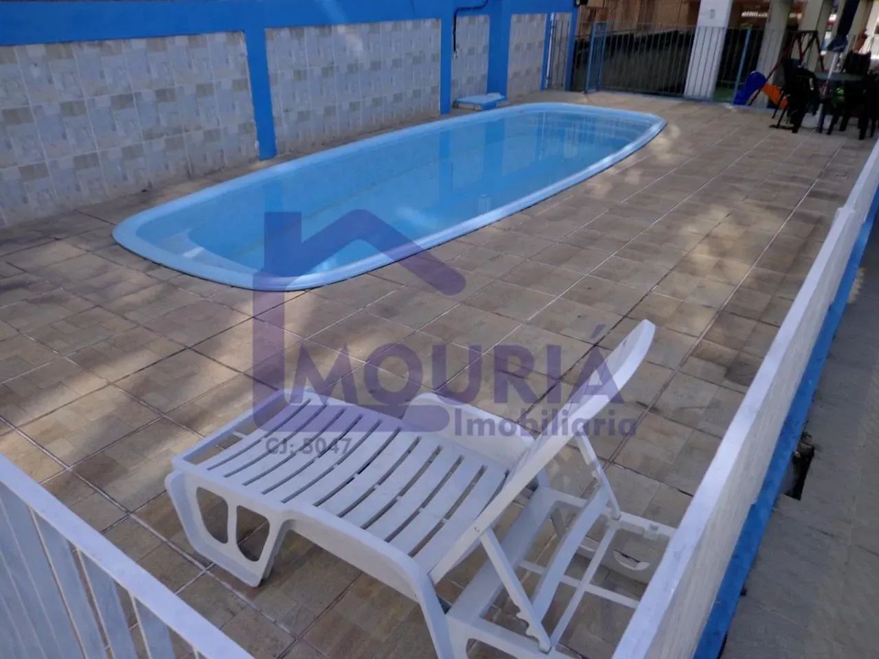 2-bedroom apartment in a building with a pool — photo 15