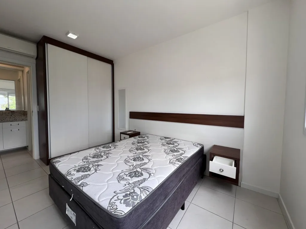 One-bedroom apartment in a building with a pool — photo 5