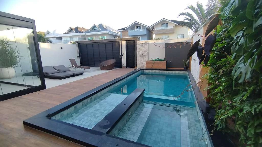 Casa mobiliada com 3 suítes e churrasco na varanda — photo 2