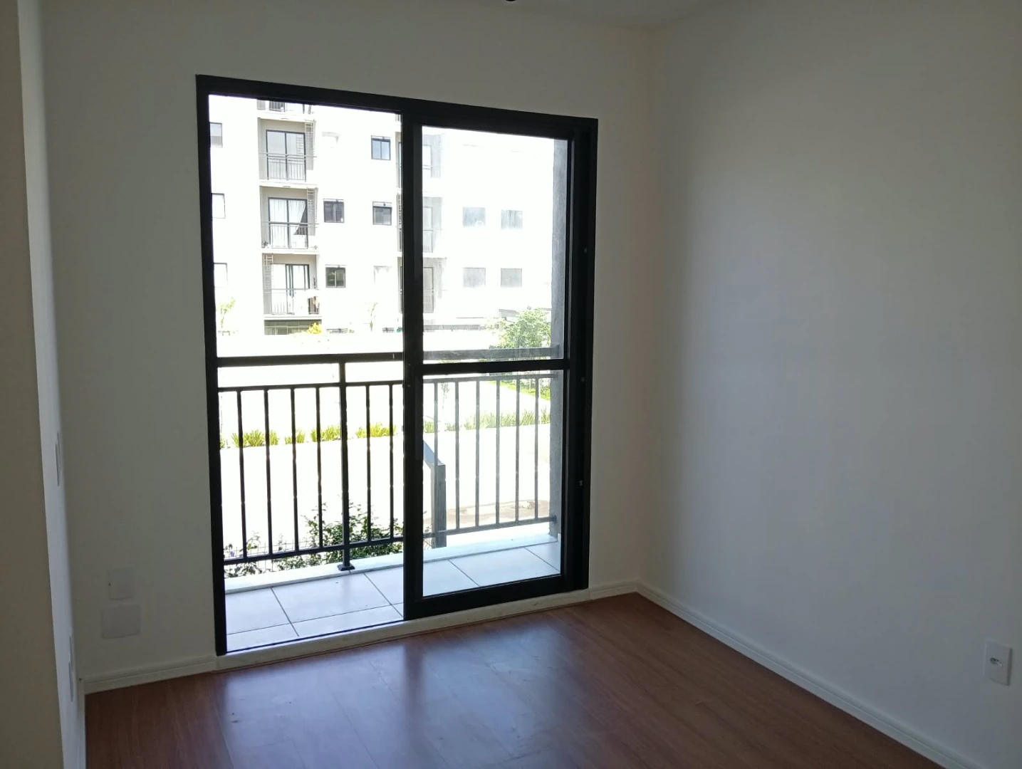 2-bedroom apartment in a building with a pool — photo 10