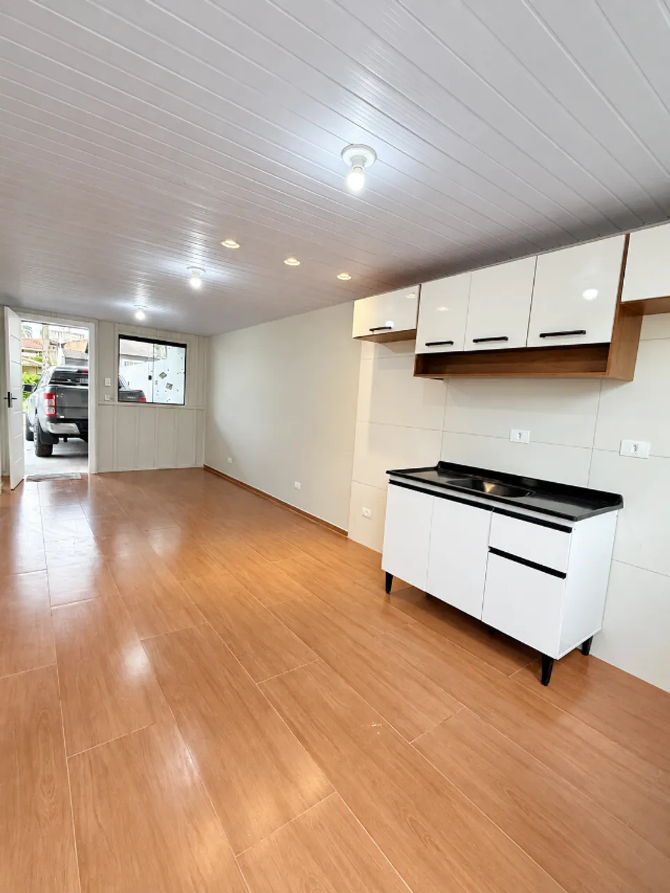 Wood or laminate floors in a 3-bedroom house, 55 m² — photo 12