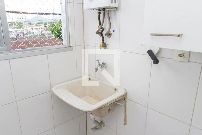 2-bedroom apartment in a building with a pool — photo 17