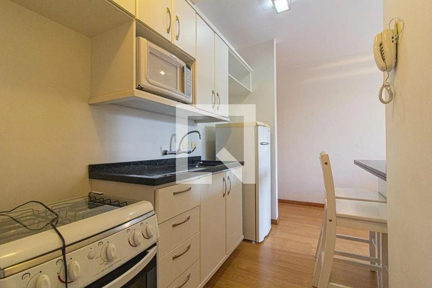 One-bedroom apartment with a washing machine — photo 16