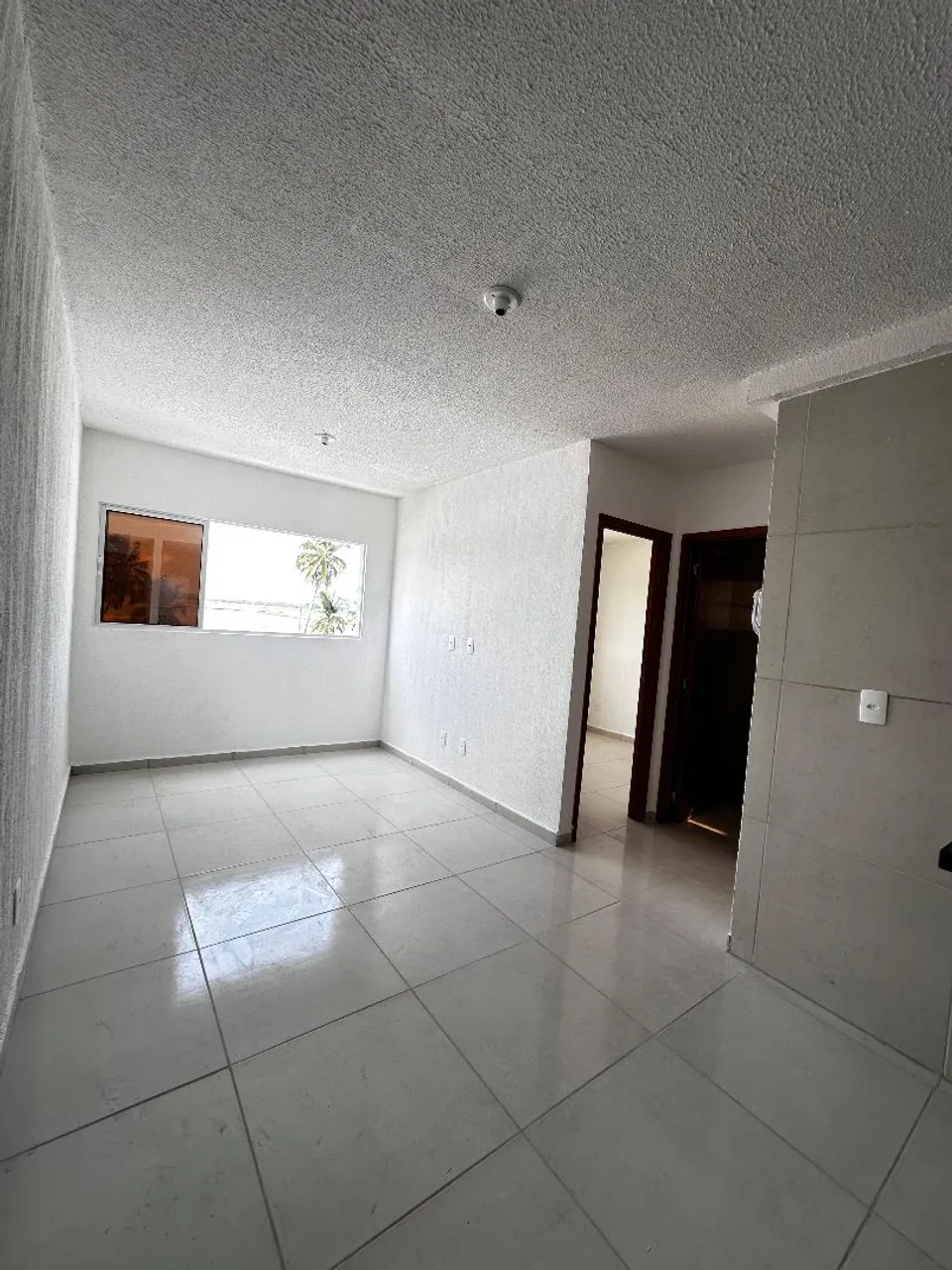 2-bedroom apartment in a building with a pool