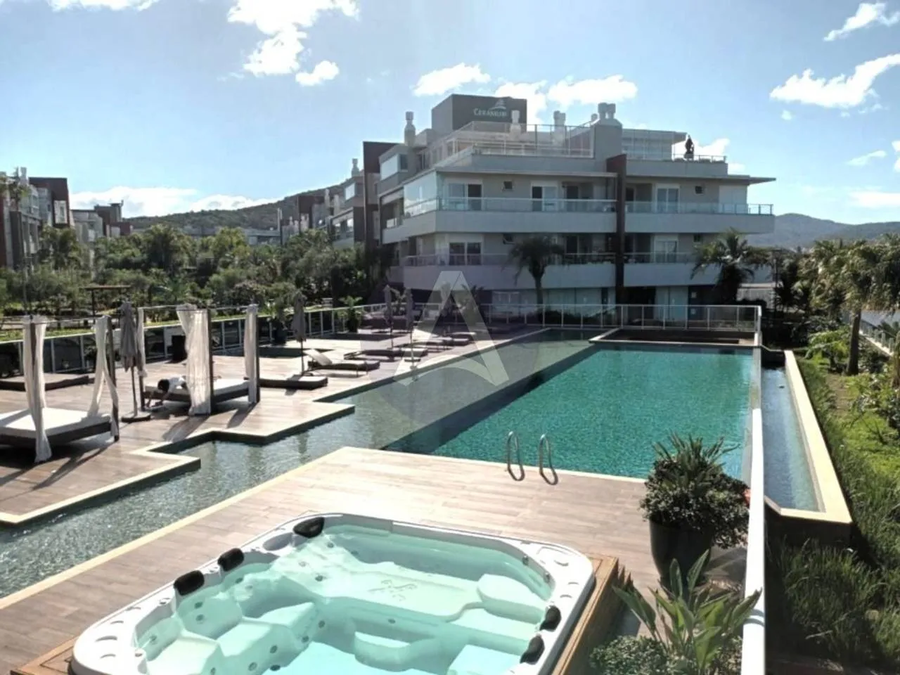 2-bedroom apartment in a building with a pool — photo 7