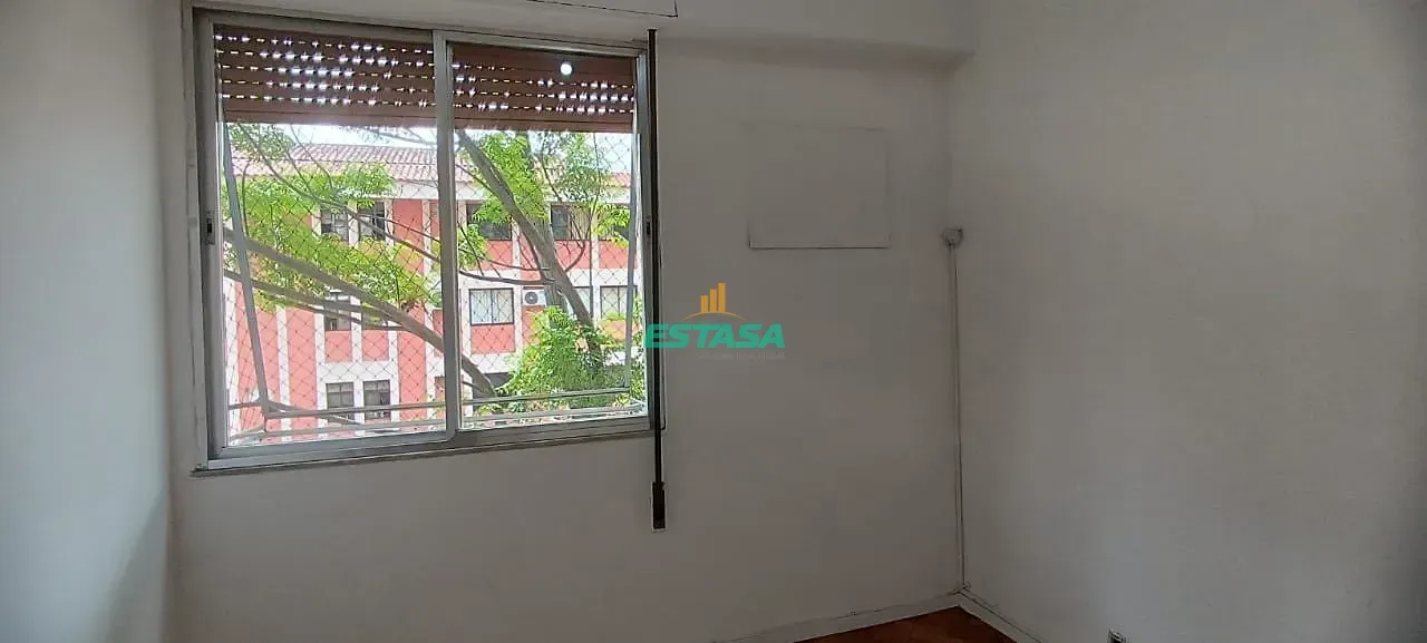 2-bedroom apartment in a building with a pool — photo 16