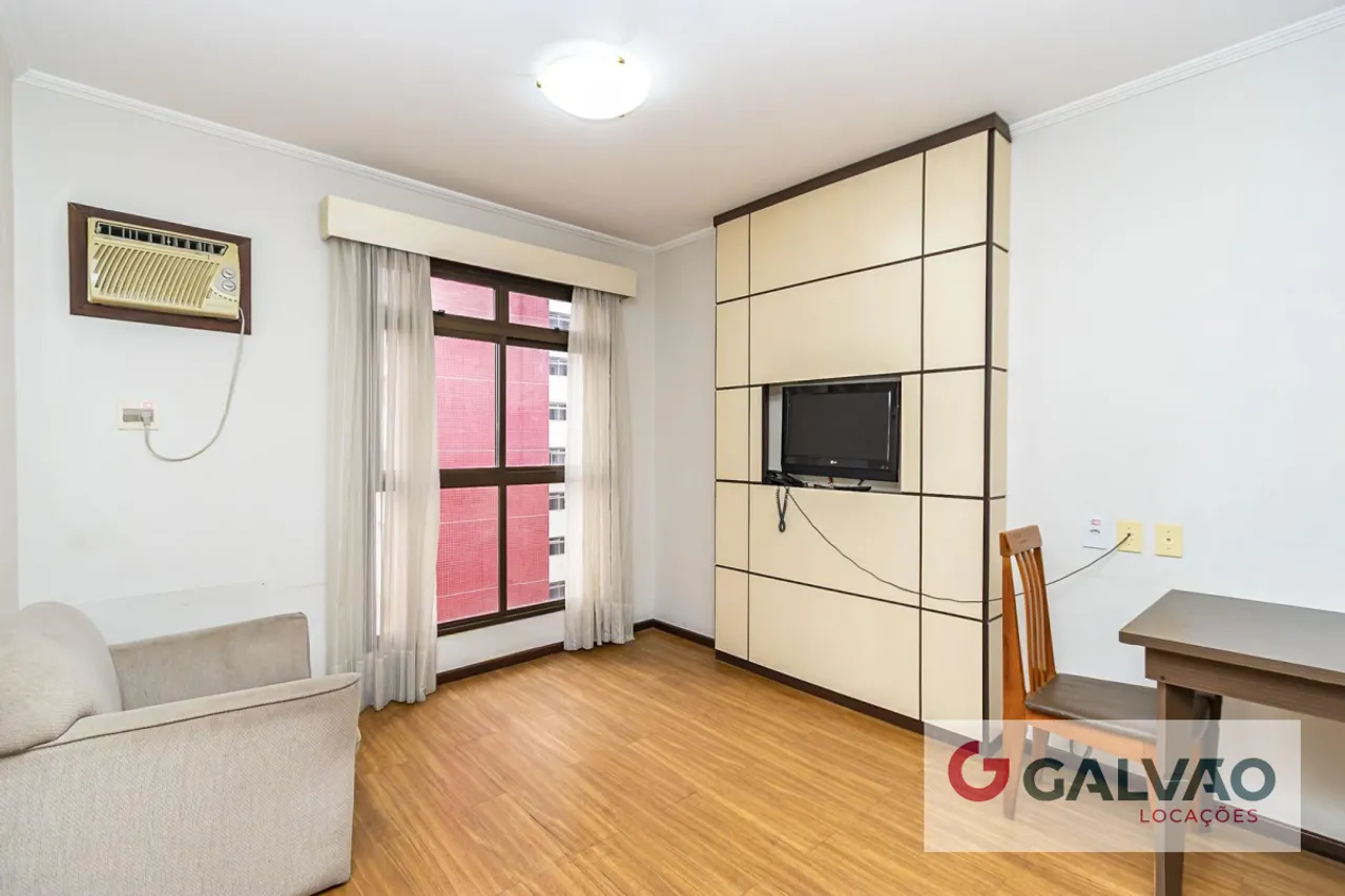 One-bedroom apartment in a building with a gym