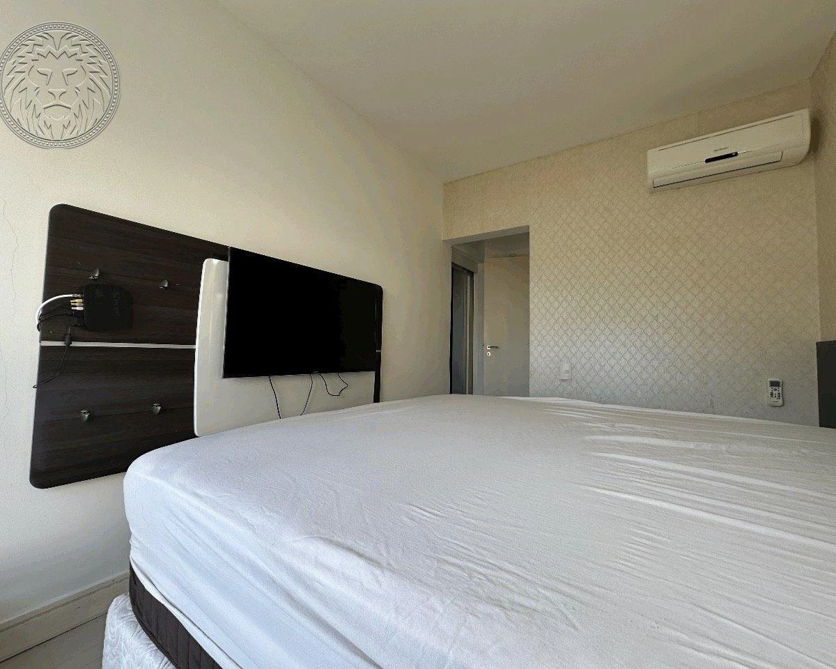 Balcony with a grill in a 2-bedroom apartment, 91 m² — photo 11