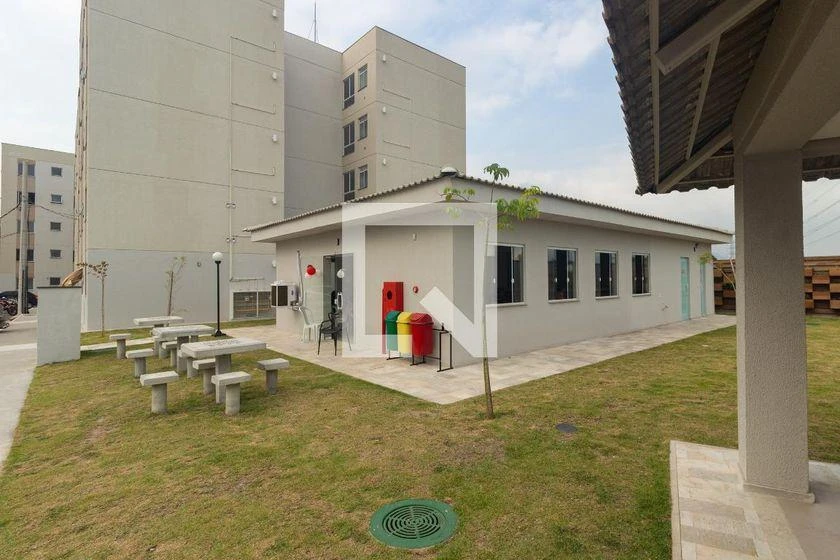 2-bedroom apartment in a building with a pool — photo 32