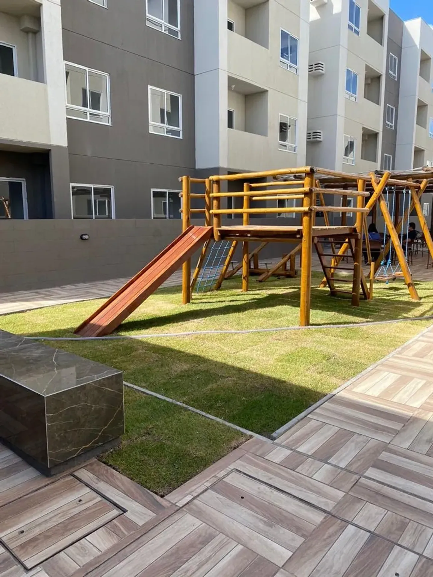 2-bedroom apartment in a building with a pool — photo 8
