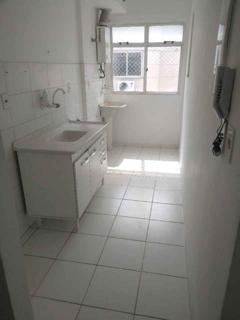 2-bedroom apartment in a building with a pool — photo 2