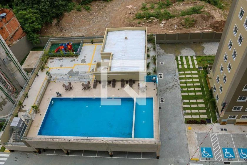 2-bedroom apartment in a building with a pool — photo 39