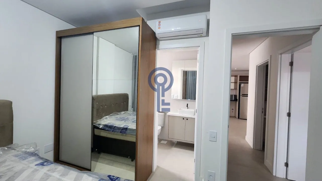 Furnished 59 m² studio with open-plan kitchen and electric stove — photo 11