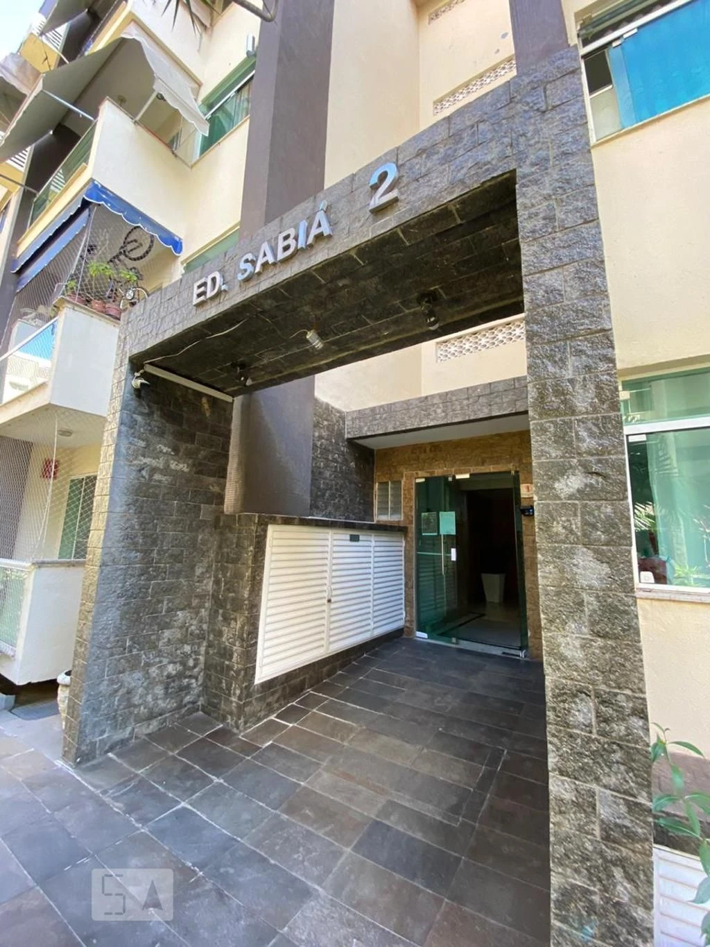 2-bedroom apartment in a building with a pool — photo 8