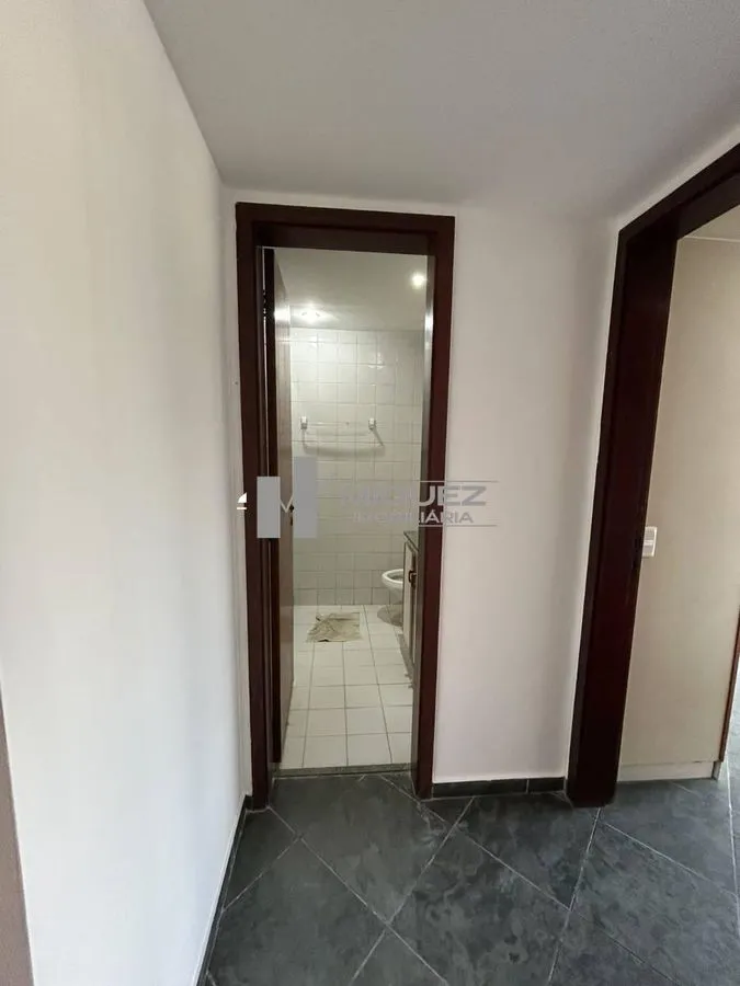 One-bedroom apartment in a building with a pool — photo 8