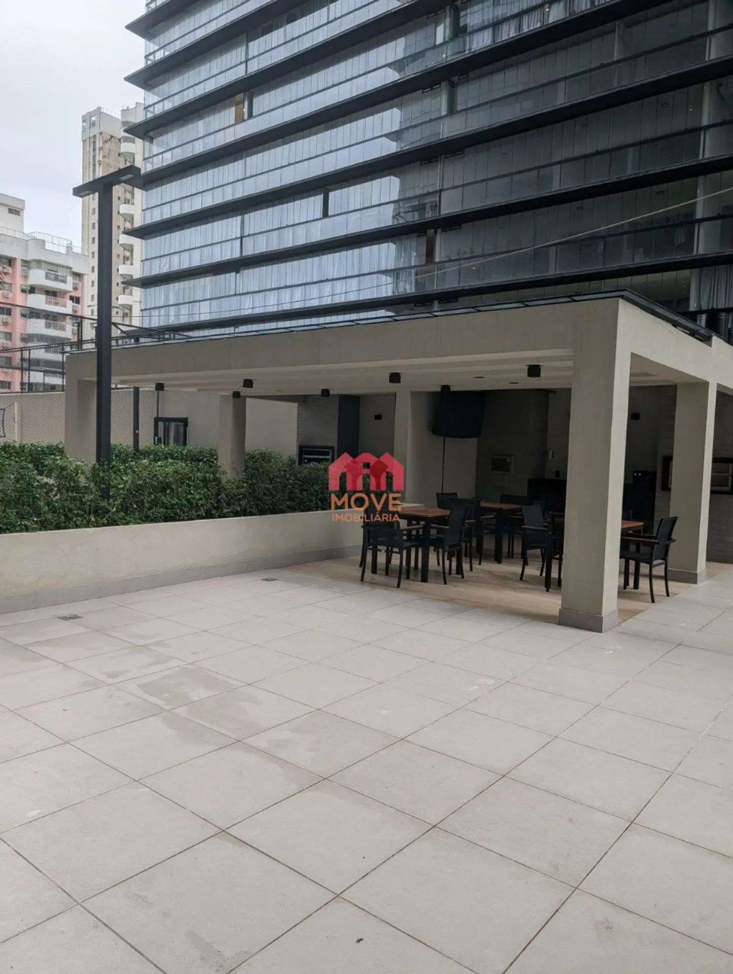 2-bedroom apartment in a building with a pool — photo 5