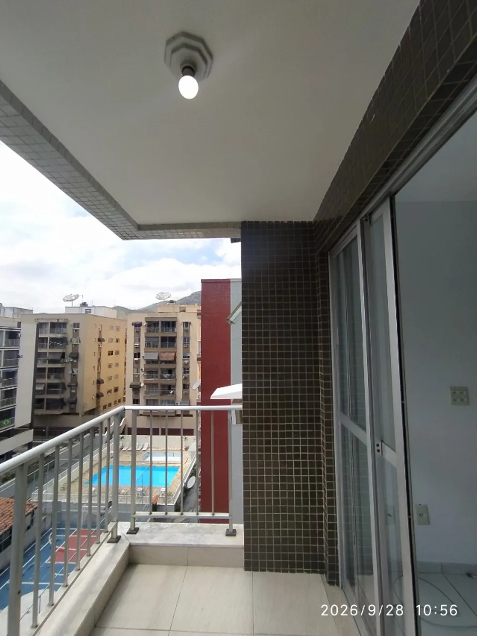2-bedroom apartment in a building with a pool — photo 8