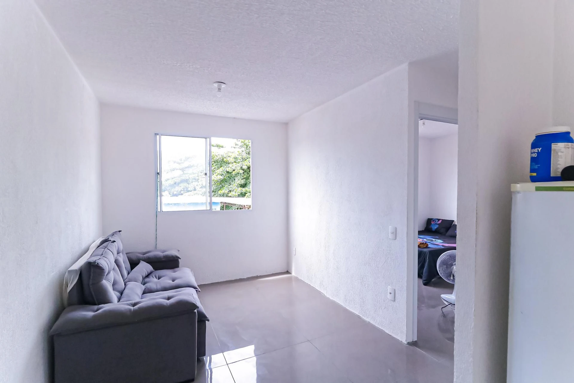 2-bedroom apartment in a building with a gym