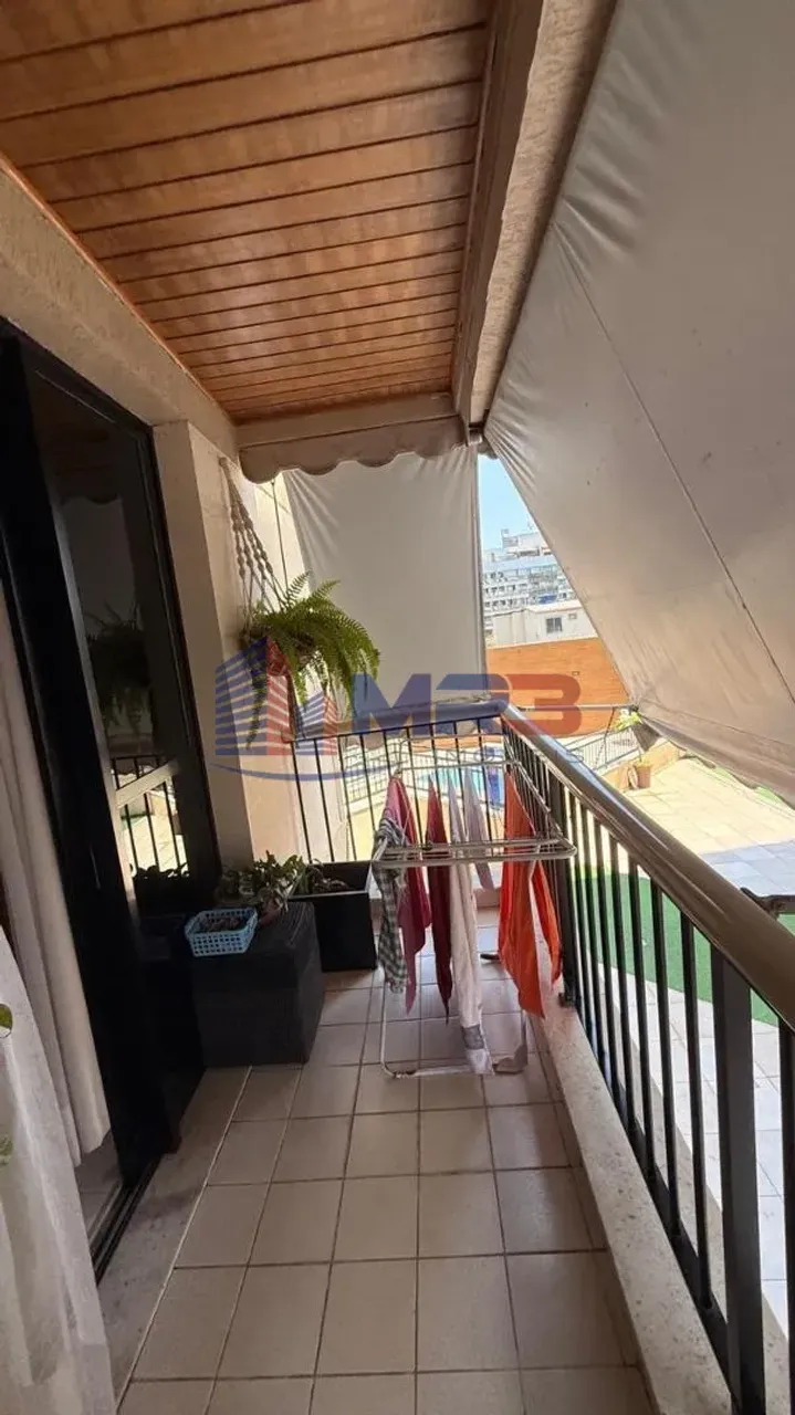 Balcony with a grill in a 2-bedroom apartment, 60 m² — photo 14
