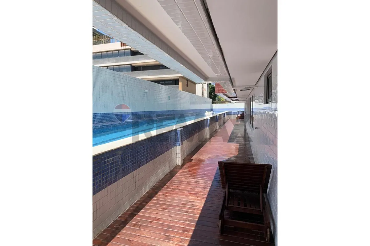 2-bedroom apartment in a building with a pool — photo 17