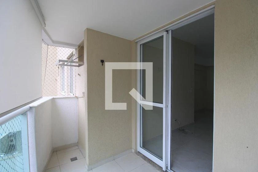 2-bedroom apartment in a building with a pool