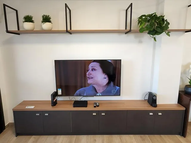 Furnished 1-bedroom apartment with 56 m² and parking — photo 11