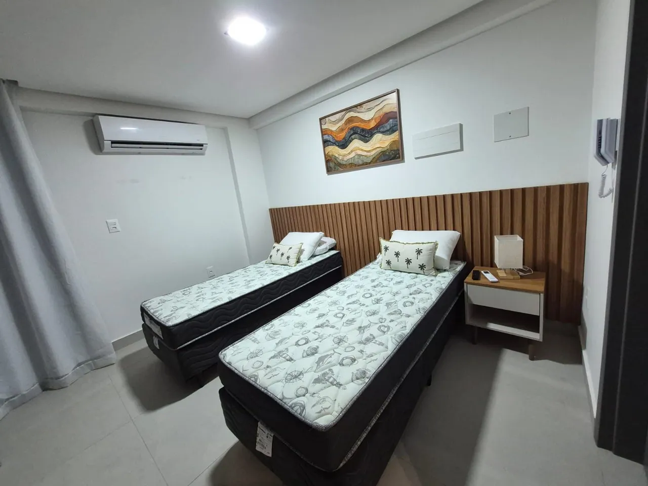 1-bedroom apartment with a compact kitchen and microwave