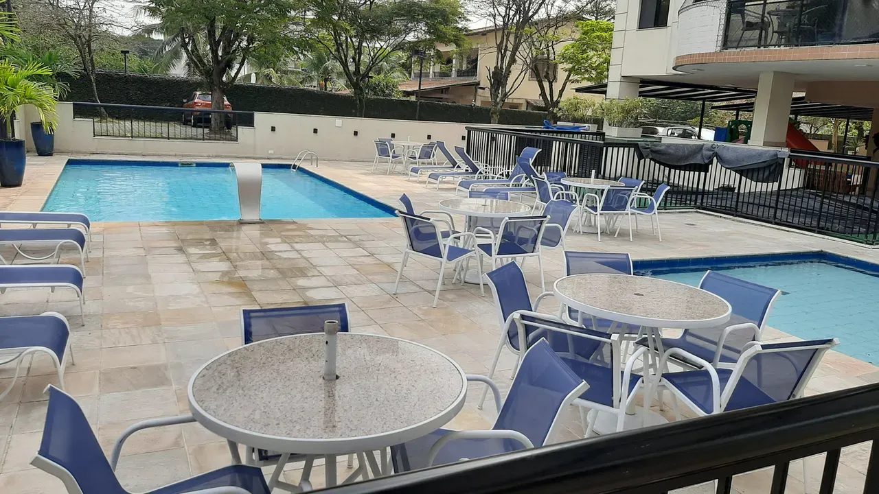2-bedroom apartment in a building with a pool