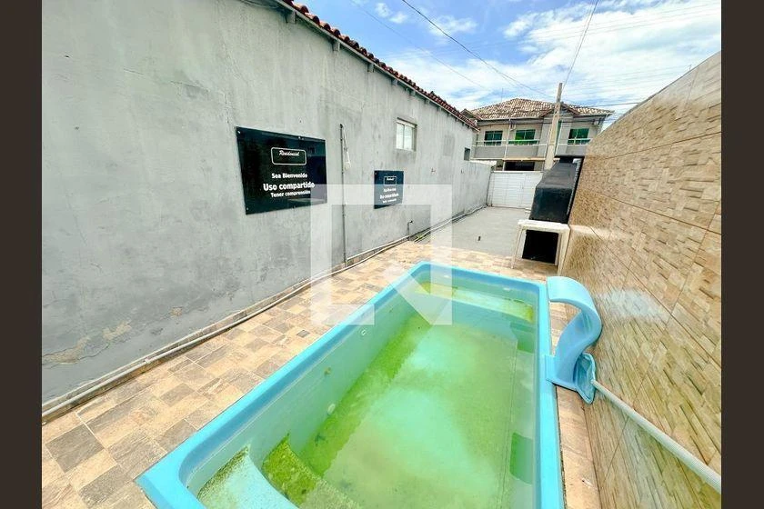 2-bedroom apartment in a building with a pool — photo 27