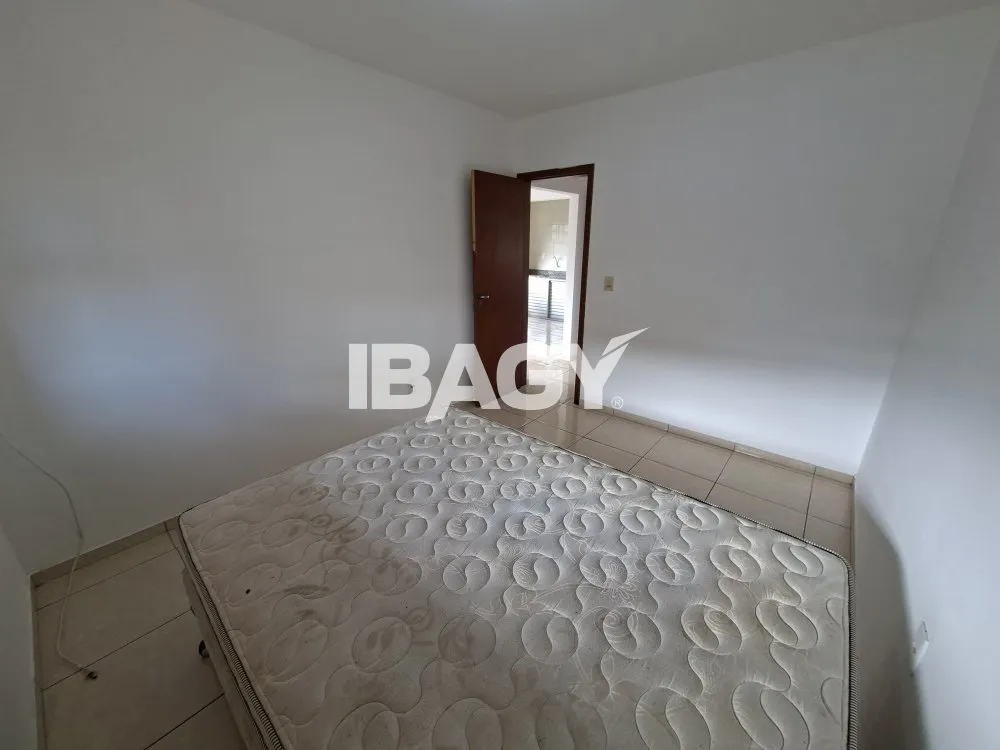 House with 2 bedrooms and a kitchen with stove and hood — photo 12