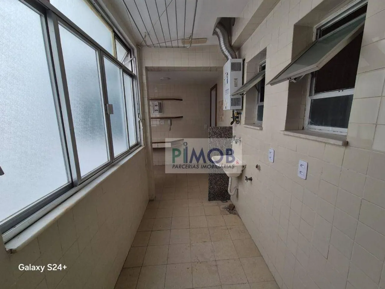 Apartamento de 2 quartos e 104 m² com área de lavanderia — photo 19