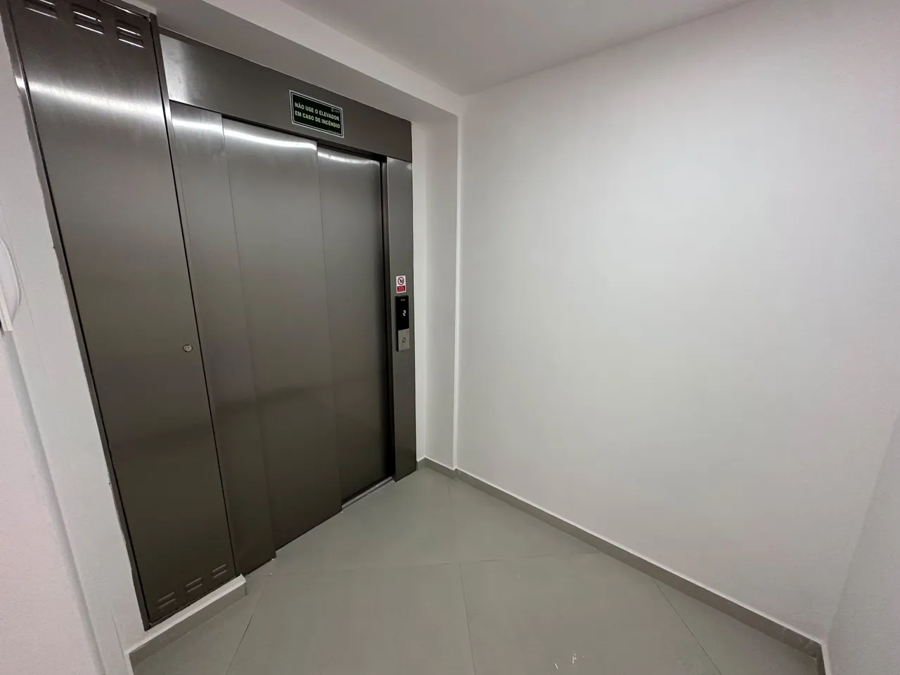 2-bedroom apartment in a building with a pool — photo 13