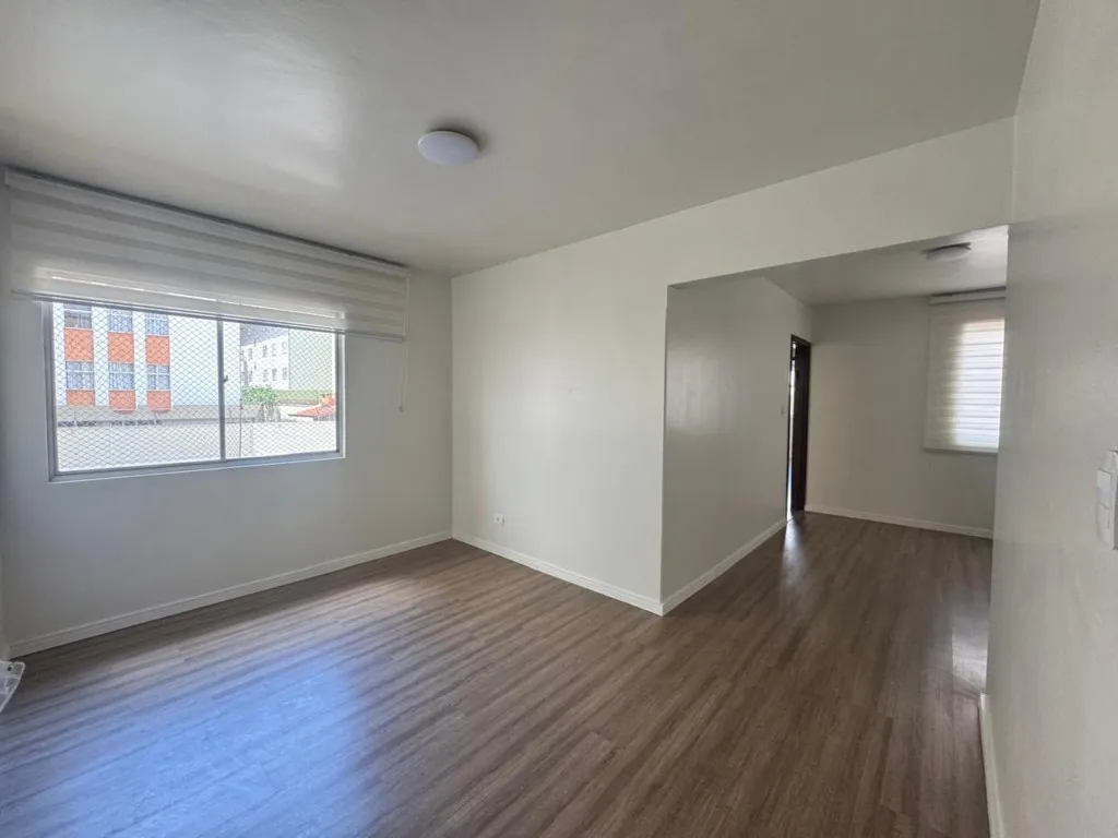 Wood or laminate floors in a 3-bedroom apartment, 64 m² — photo 12