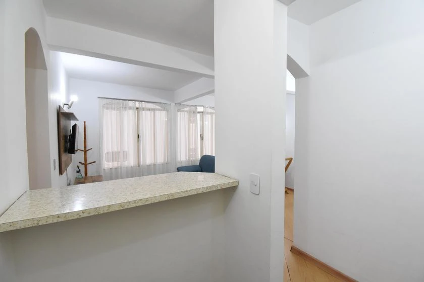 1-bedroom apartment with open-plan kitchen and gas stove — photo 10