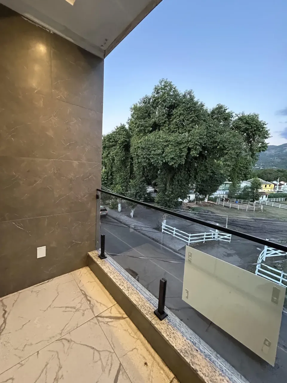 Unfurnished apartment with open-plan kitchen and balcony — photo 7