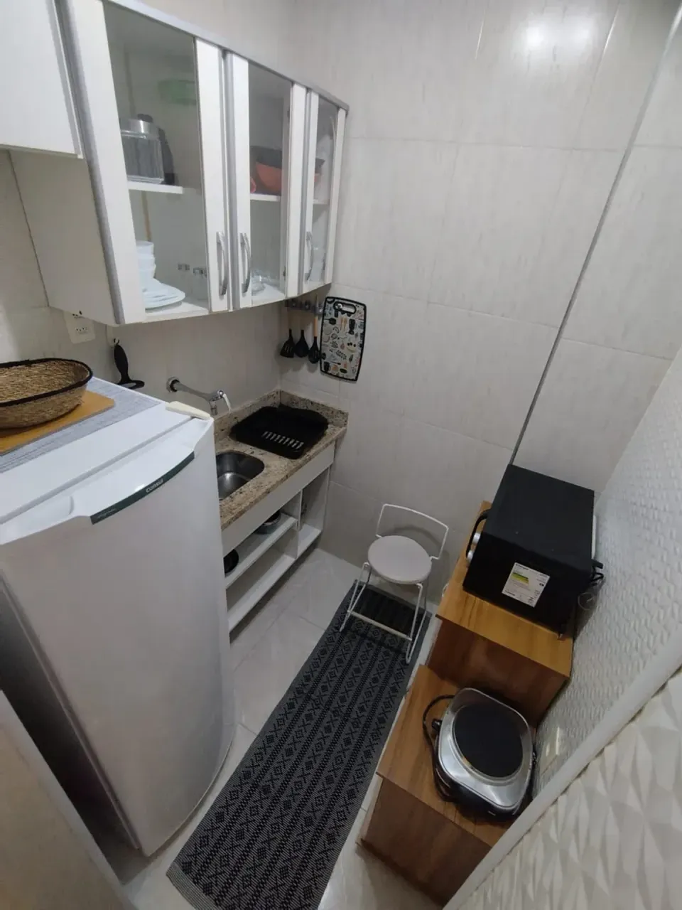 Furnished apartment with a compact cooking setup — photo 3