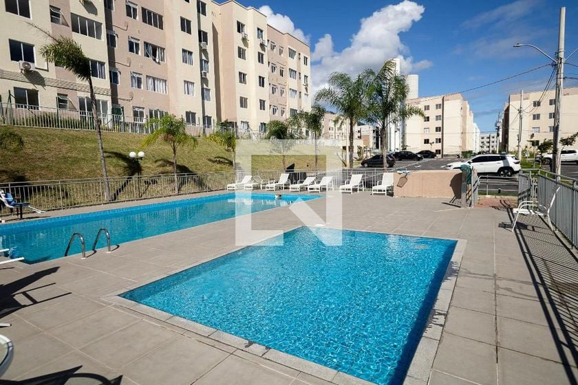 2-bedroom apartment in a building with a pool — photo 25