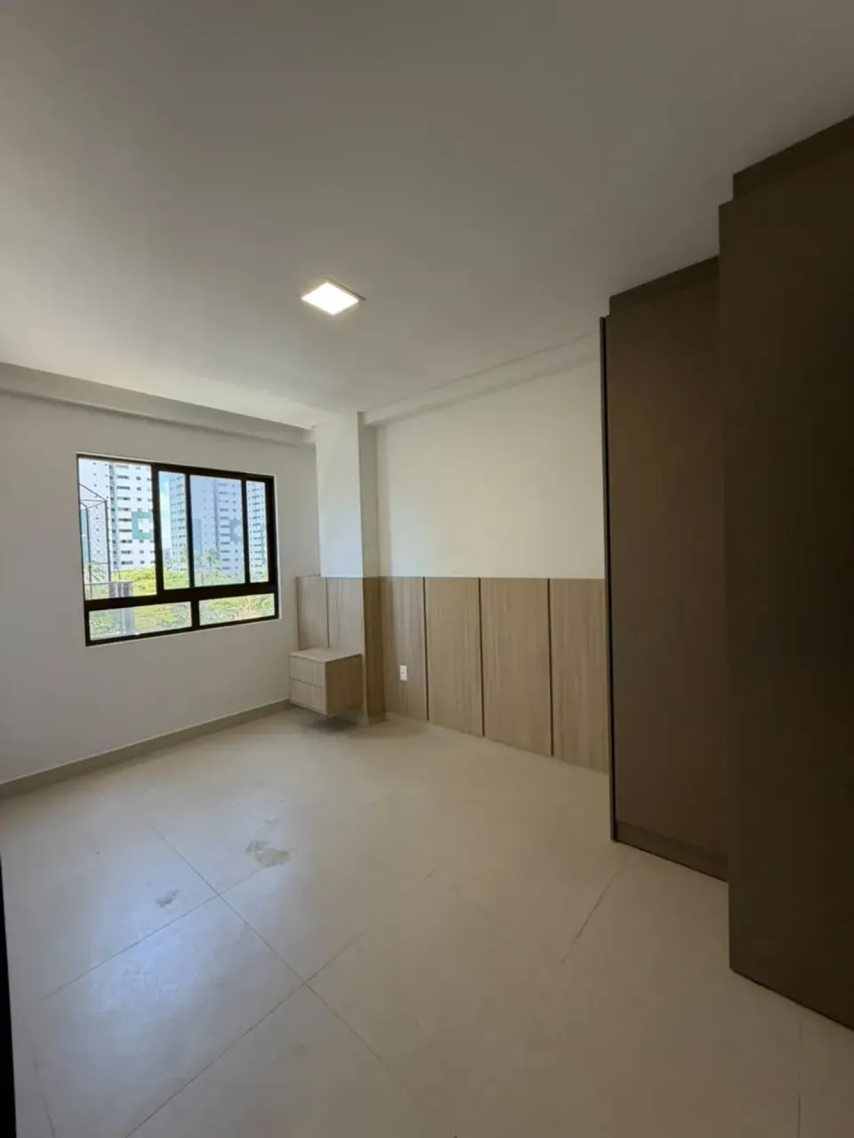 2-bedroom apartment in a building with a pool — photo 5