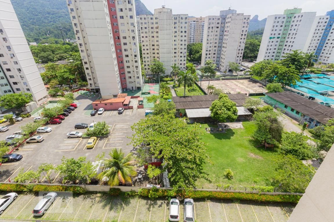 2-bedroom apartment in a building with a pool — photo 9