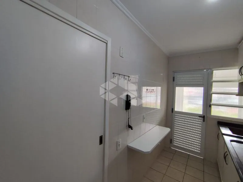 2-bedroom apartment in a building with a pool — photo 10