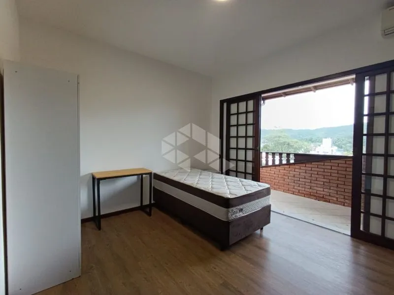 Studio in a building with a pool
