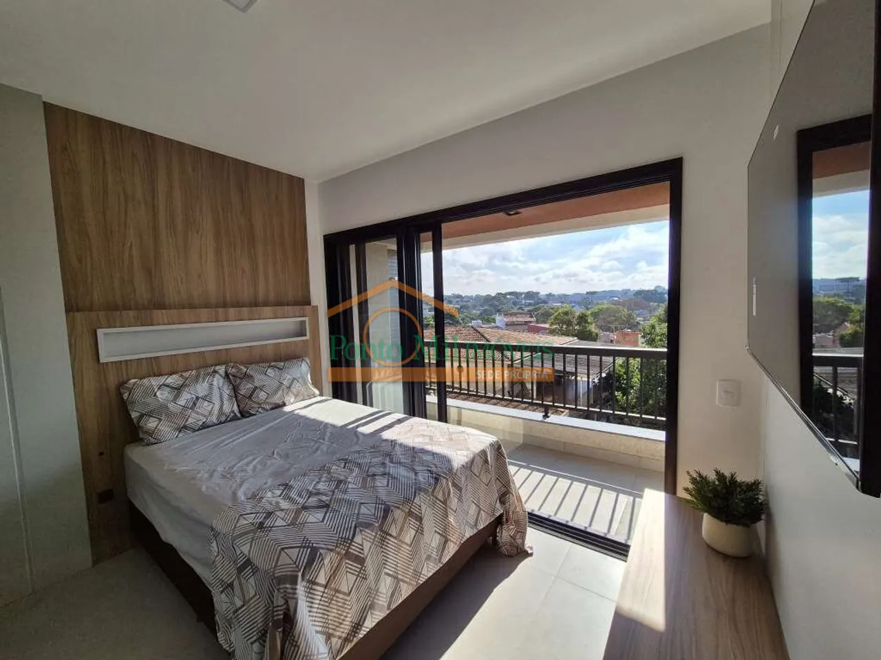 Furnished apartment with open-plan kitchen and balcony