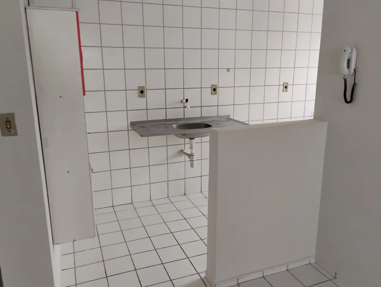 Apartment with fitted kitchen cabinets and laundry area — photo 7