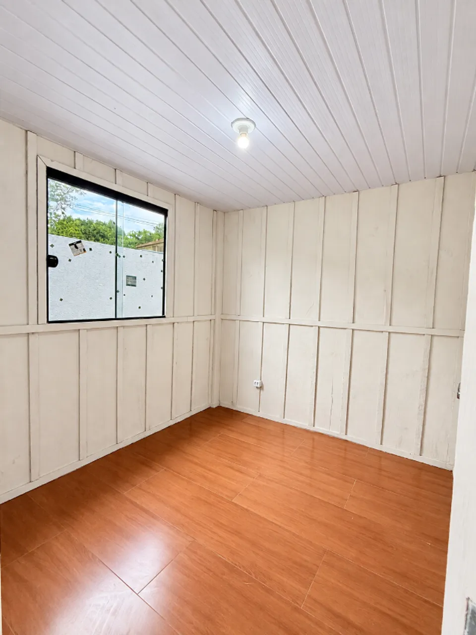 Wood or laminate floors in a 3-bedroom house, 55 m² — photo 5