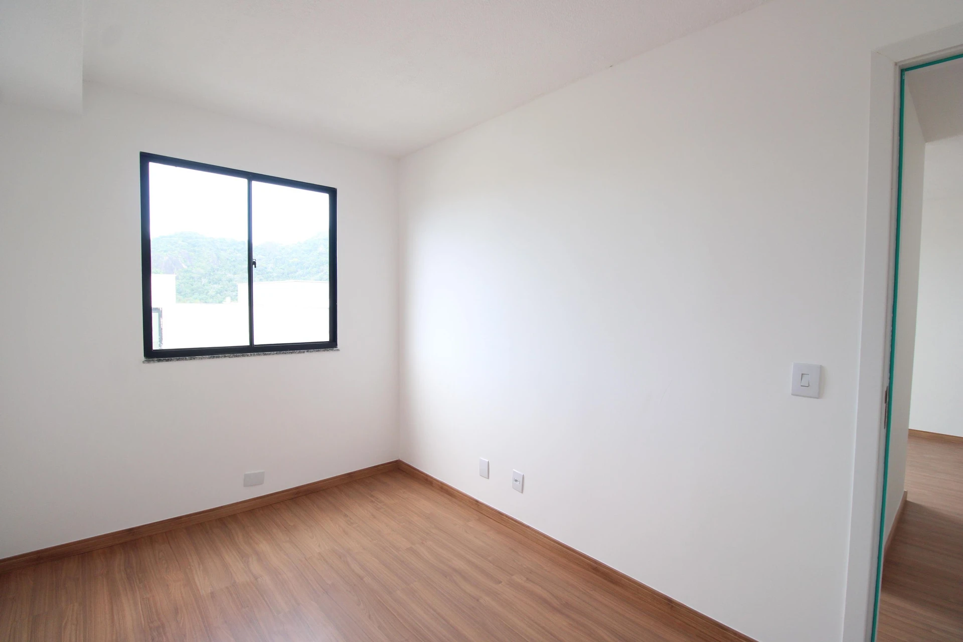 Unfurnished 2-bedroom apartment with balcony and private garden — photo 11