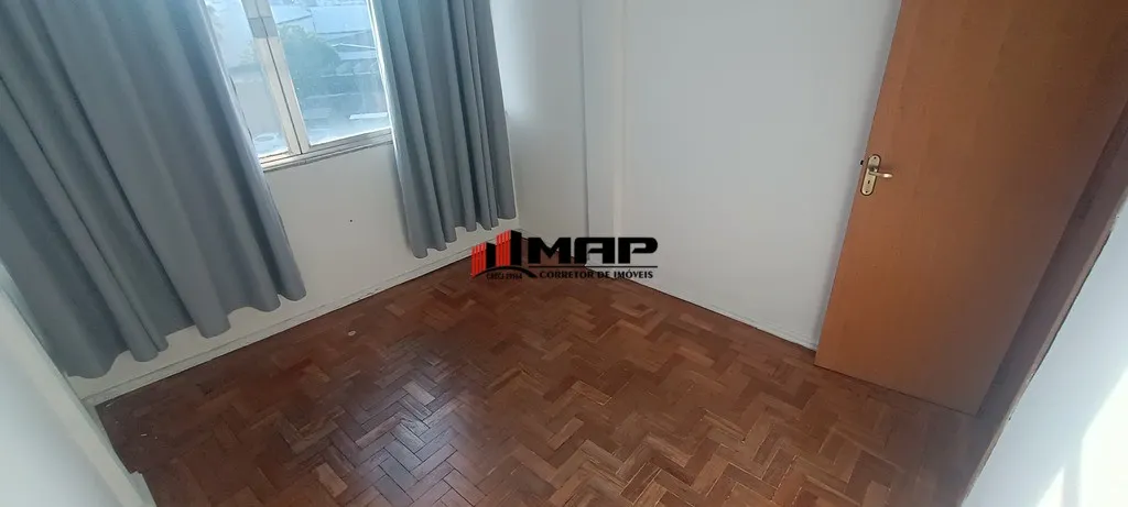 2-bedroom apartment with a compact kitchen and stove — photo 10