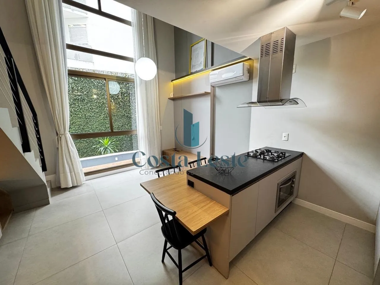One-bedroom apartment in a building with a gym
