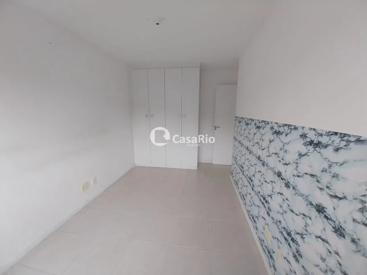 2-bedroom apartment in a building with a pool — photo 3